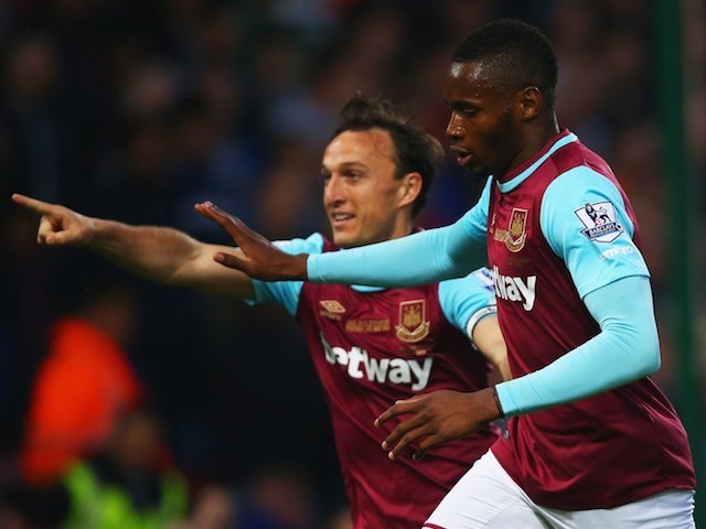 Diafra Sakho celebrates scoring with Mark Noble during the Premier League game between West Ham United and Manchester United on May 10, 2016